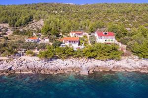 an aerial view of a house on an island in the water at KUĆA IVANA in Prizba