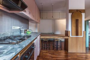 Kuchyň nebo kuchyňský kout v ubytování Unione, Bologna by Short Holidays