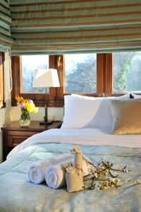 Een bed of bedden in een kamer bij Guesthouse Kapaniaris