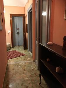 a hallway with a room with a door and a room with a hallway at FRONTE PO in Turin