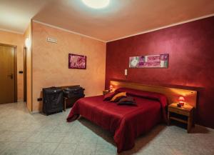 Postel nebo postele na pokoji v ubytování Hotel Venere