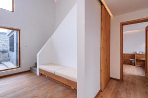 Hangzhou Moju Boutique Guesthouse at the West Lake客房内的一张或多张床位