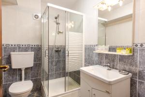Koupelna v ubytování Hotel Herastrau