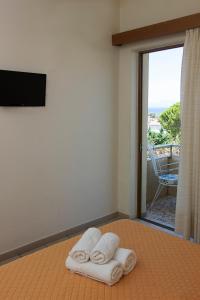 Postel nebo postele na pokoji v ubytování HOTEL STOUPA