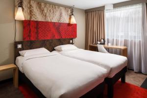 Ein Bett oder Betten in einem Zimmer der Unterkunft ibis Birmingham Centre Irving Street