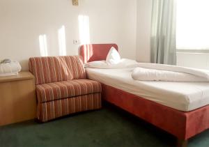 Łóżko lub łóżka w pokoju w obiekcie Hotel Nassereinerhof