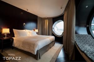 Postel nebo postele na pokoji v ubytování Hotel Topazz & Lamée