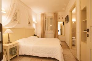 Letto o letti in una camera di Relais in Contrada