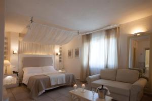 Letto o letti in una camera di Relais in Contrada