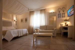 Letto o letti in una camera di Relais in Contrada