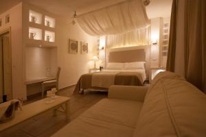 Letto o letti in una camera di Relais in Contrada