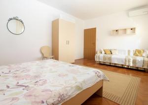 Krevet ili kreveti u jedinici u objektu Apartments Mira 1804