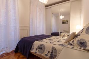 Un ou plusieurs lits dans un hébergement de l'établissement Light and airy apartment in the Old Nice