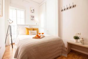 Posteľ alebo postele v izbe v ubytovaní Mezquitilla FreshApartments