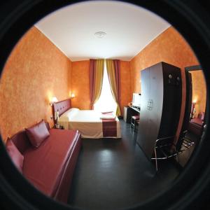 Posteľ alebo postele v izbe v ubytovaní Pisolo Resort