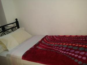 
Кровать или кровати в номере Riad Espagne
