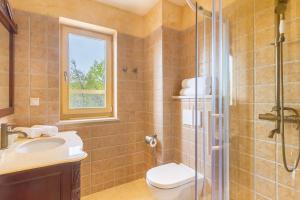 Koupelna v ubytování DeLuxe Villa Suza