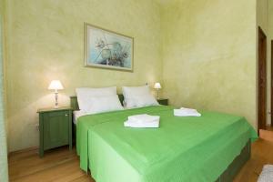 Postel nebo postele na pokoji v ubytování DeLuxe Villa Suza + 13 fotografií