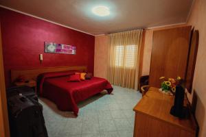 Postel nebo postele na pokoji v ubytování Hotel Venere