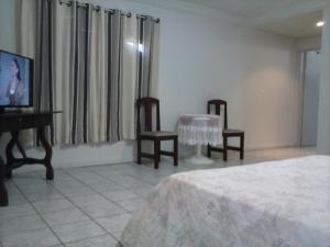 Afbeelding uit fotogalerij van Otellin Triumph Hotel in Triunfo