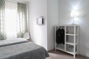 Posteľ alebo postele v izbe v ubytovaní Blanc Guest House