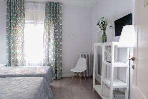 Posteľ alebo postele v izbe v ubytovaní Blanc Guest House