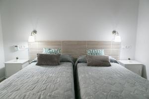 Posteľ alebo postele v izbe v ubytovaní Blanc Guest House