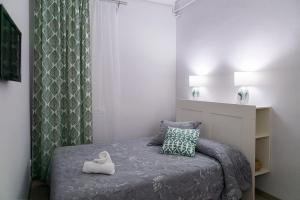 Posteľ alebo postele v izbe v ubytovaní Blanc Guest House