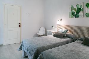 Posteľ alebo postele v izbe v ubytovaní Blanc Guest House