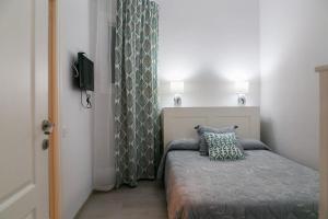 Posteľ alebo postele v izbe v ubytovaní Blanc Guest House