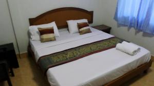 Cama o camas de una habitación en Aonang SR Bungalows