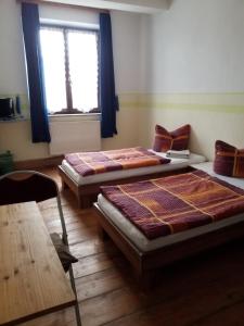 
Ein Bett oder Betten in einem Zimmer der Unterkunft Mama Leone
