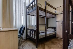 Postel nebo postele na pokoji v ubytování Centrum Hostel
