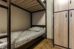 Postel nebo postele na pokoji v ubytování Centrum Hostel