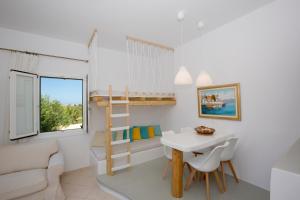 Postel nebo postele na pokoji v ubytování Valena Mare Suites & Apartments