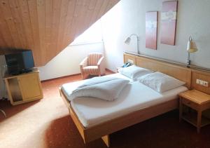 Łóżko lub łóżka w pokoju w obiekcie Hotel Nassereinerhof