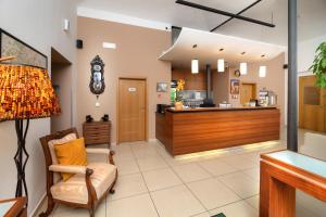 Posedenie v ubytovaní Hotel Chvalská Tvrz