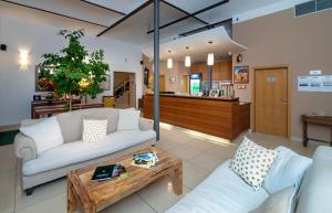 Posedenie v ubytovaní Hotel Chvalská Tvrz
