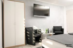 Fotografie z fotogalerie ubytování Pension am Treiser Kiosk v destinaci Treis-Karden + 87 fotografií