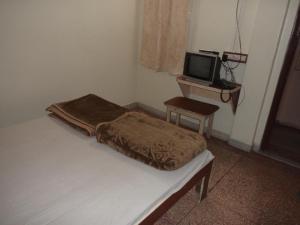 インドールにあるVijay Palaceの表示料金は、テレビとテーブルが備わる客室のベッド1台分です。