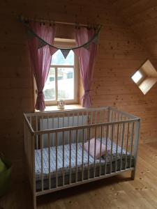 Postel nebo postele na pokoji v ubytování Chalupa Rozmarýna