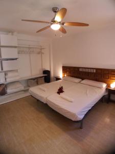 Posteľ alebo postele v izbe v ubytovaní Fantástico Apartamento 1ª Línea de Playa