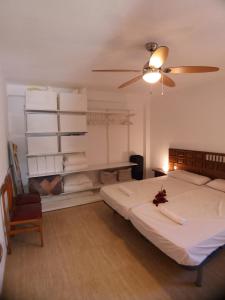 Posteľ alebo postele v izbe v ubytovaní Fantástico Apartamento 1ª Línea de Playa