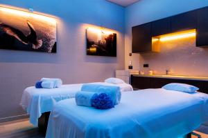 Posteľ alebo postele v izbe v ubytovaní Alàbriga Hotel GL