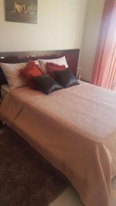 En eller flere senge i et værelse på la CASITA DEL CORAZON