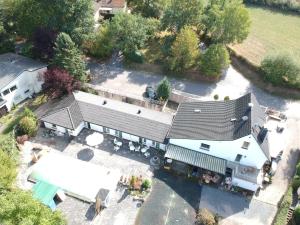 an aerial view of a house with a building at Pension Yak und Yeti in Bad Honnef am Rhein