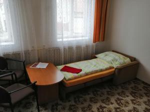 Postel nebo postele na pokoji v ubytování U Ladi