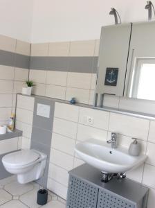 Koupelna v ubytování Ferienwohnung Staufenberg + 2 fotografie