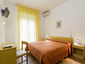 Postel nebo postele na pokoji v ubytování Hotel Meris