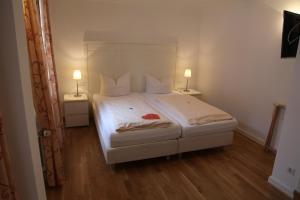 Postel nebo postele na pokoji v ubytování Hotel Bacchus Wine & Bites